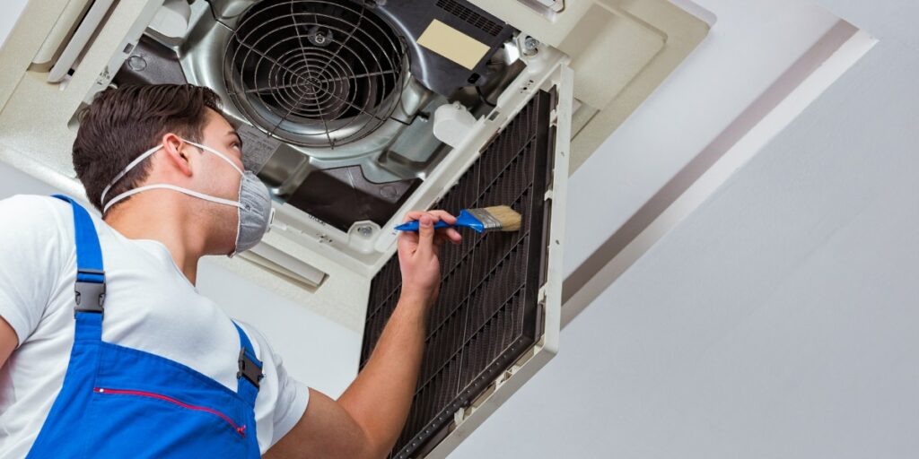 Use a soft brush to remove dust and debris from the air filter
