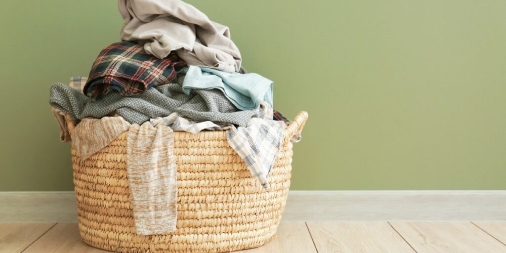 laundry basket near the bedroom